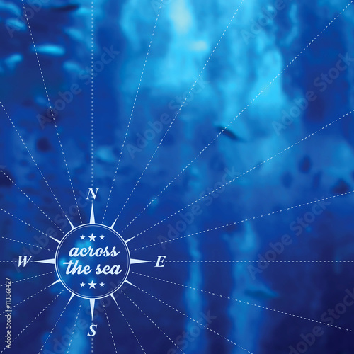 Blurred background with marine landscape and wind rose label