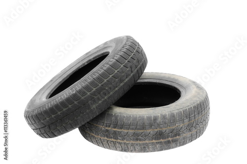 Old tires stacked, isolated on white background