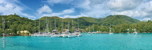 panoramic view of baie saint anne harbour in praslin island seychelles