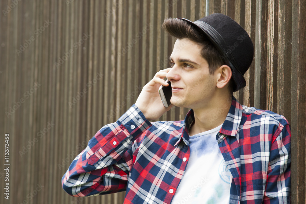 young man talking on phone young man talking on phone
