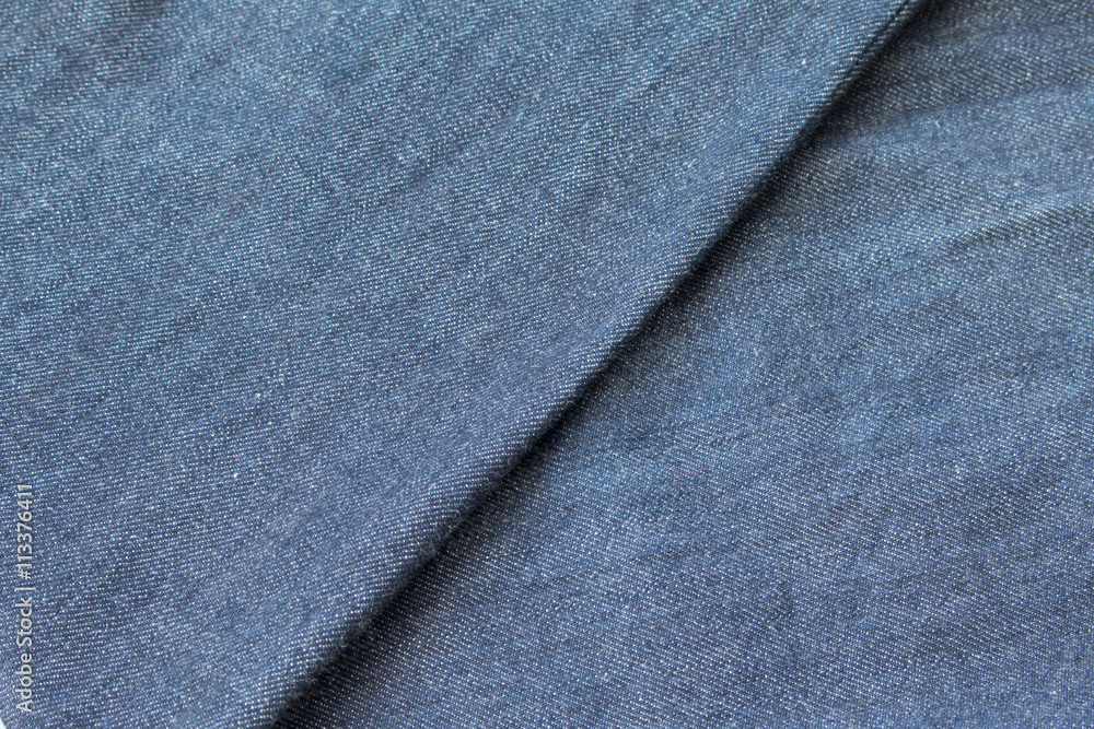 Naklejka premium Texture of old jeans background