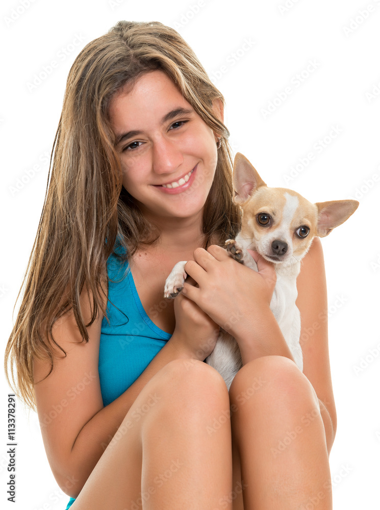 Happy hispanic teenage girl with her small dog Happy hispanic teenage girl with her small dog