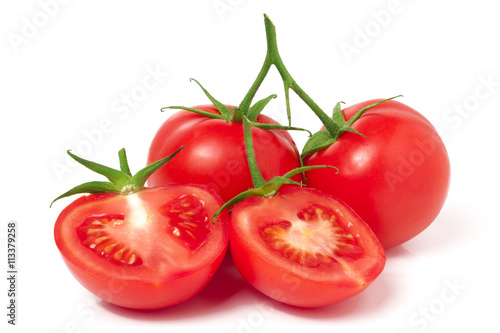 branch of tomato with half isolated on white background