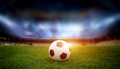 Soccer ball on the field of stadium