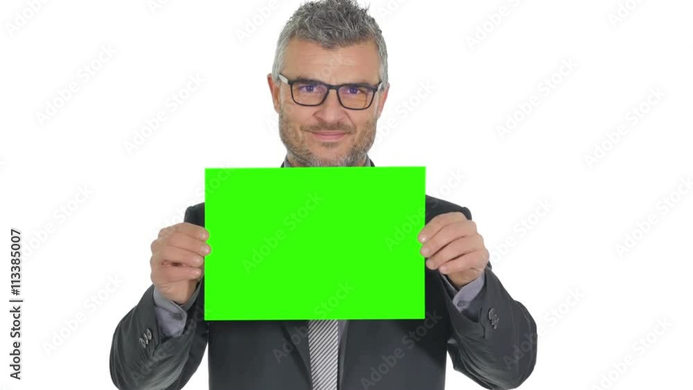 happy busines man raising holding a green board pre keyed happy busines man raising holding a green board pre keyed