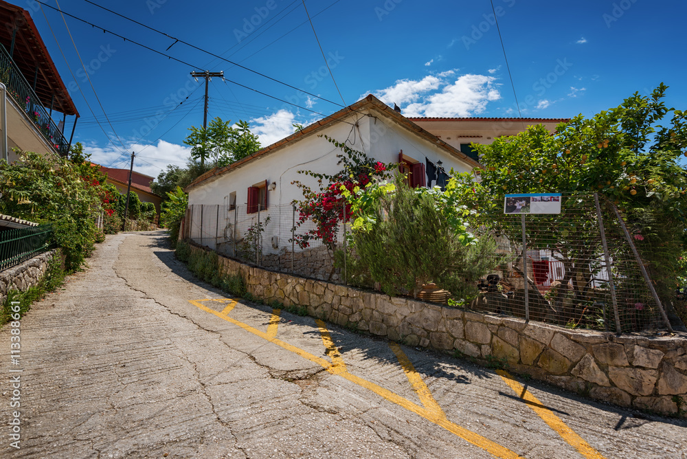 Along the narrow streets of Paxos island, Ionian Sea, Greece Along the narrow streets of Paxos island, Ionian Sea, Greece