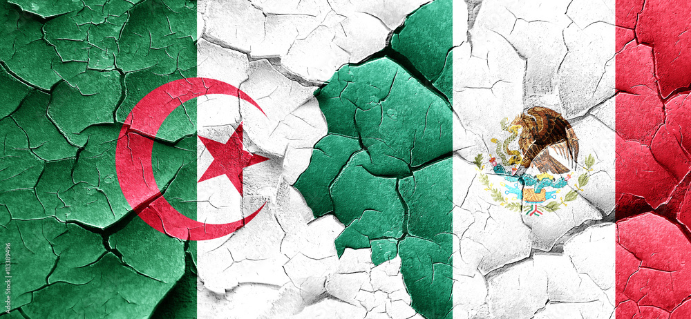 algeria flag with Mexico flag on a grunge cracked wall