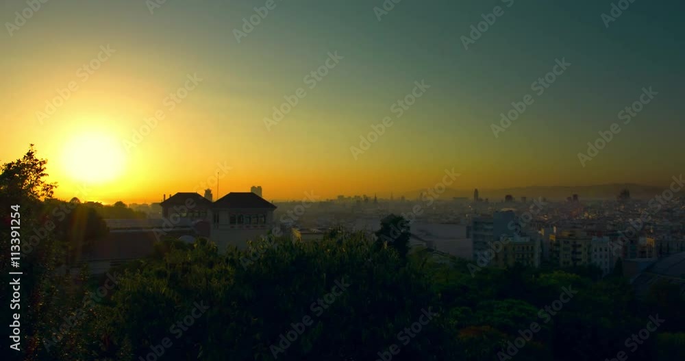 Barcelona sunrise timelapse. View of city from Montjuic. Time lapse of summer sunrise at city. Timelapse of sunrise in Barcelona city, Spain. Cloudless sky. Barcelona skyline. City panorama at morning Barcelona sunrise timelapse. View of city from Montjuic. Time lapse of summer sunrise at city. Timelapse of sunrise in Barcelona city, Spain. Cloudless sky. Barcelona skyline. City panorama at morning