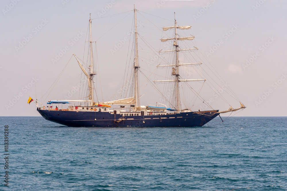 Sail boat near Galapagos Islands on Pacific ocean