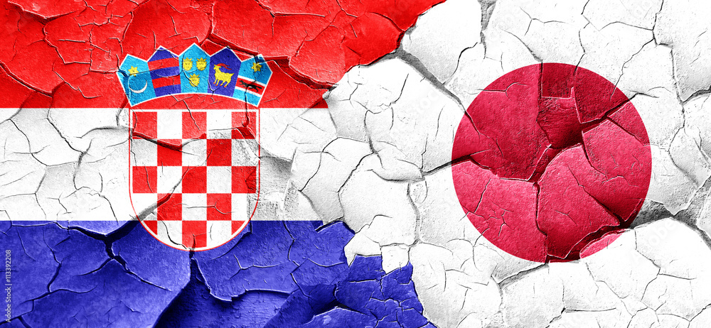 croatia flag with Japan flag on a grunge cracked wall croatia flag with Japan flag on a grunge cracked wall