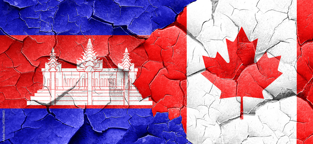Cambodia flag with Canada flag on a grunge cracked wall