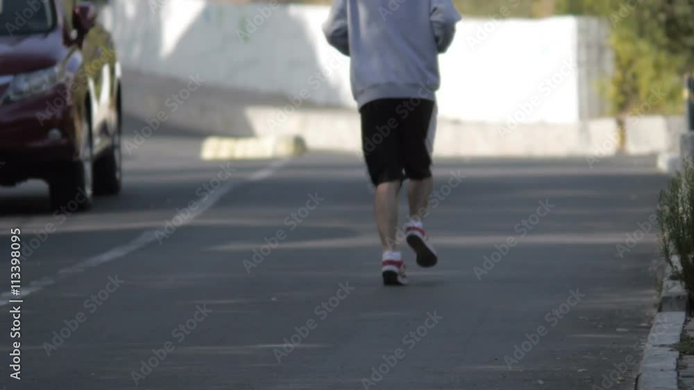 Man Running at Sunrise in City Man Running at Sunrise in City