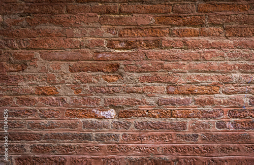 Old    brick wall in Venice, Italy