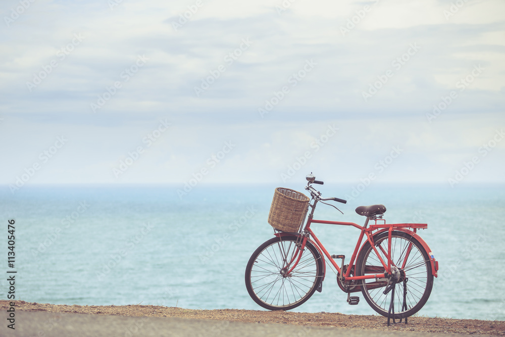 Red Japan style classic bicycle at ocean view point Red Japan style classic bicycle at ocean view point