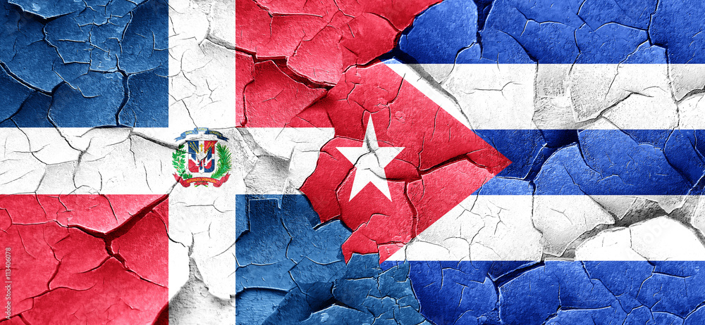 dominican republic flag with cuba flag on a grunge cracked wall