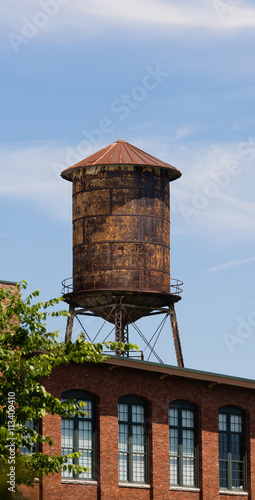 Old Rusted Rooftop Water Tower Urban Industrial Architecture