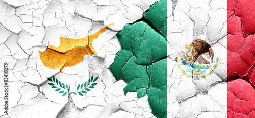 Cyprus flag with Mexico flag on a grunge cracked wall