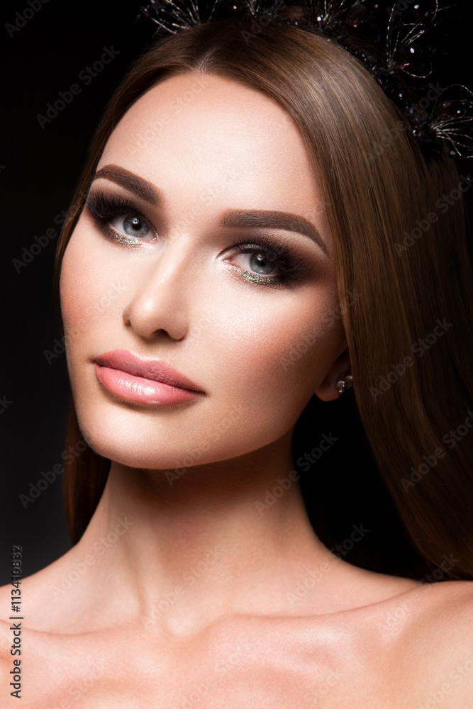 Close-up portrait of beautiful woman with bright make-up and hairstyle. Close-up portrait of beautiful woman with bright make-up and hairstyle.