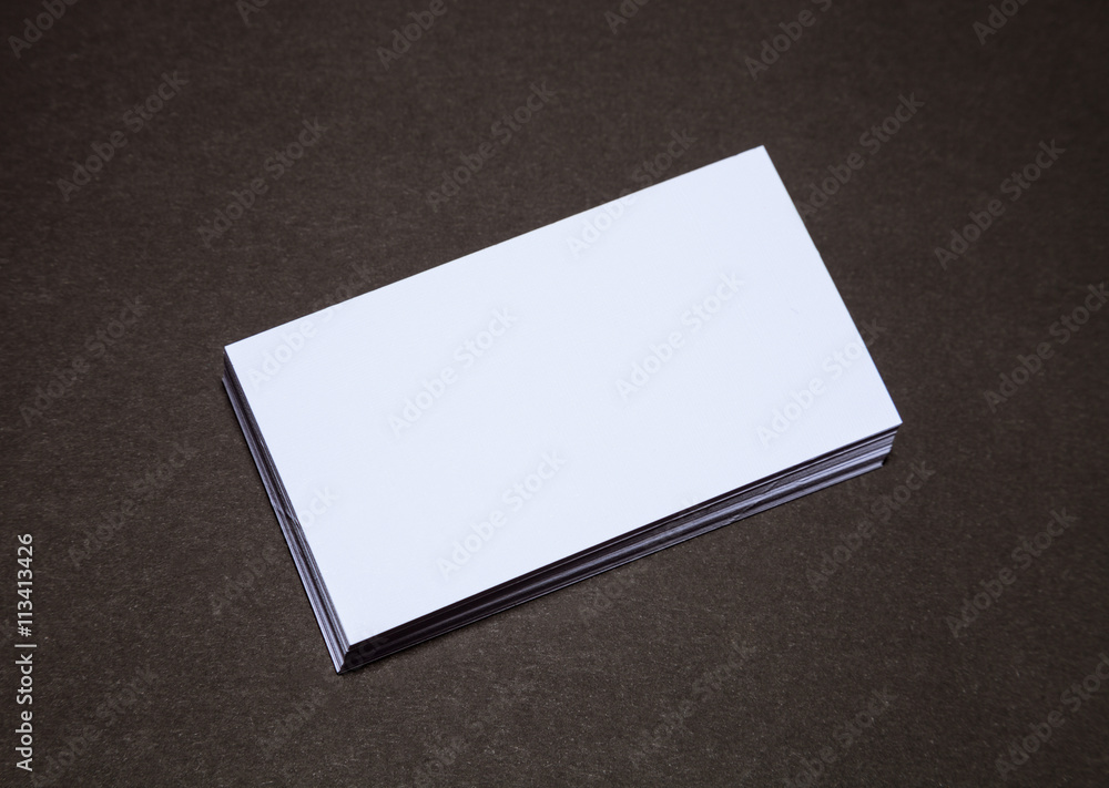 Empty business cards on dark background Empty business cards on dark background