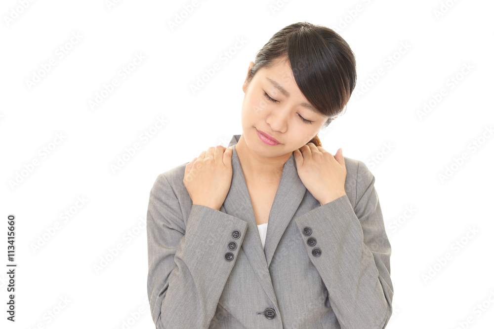 肩こりに悩む女性 肩こりに悩む女性
