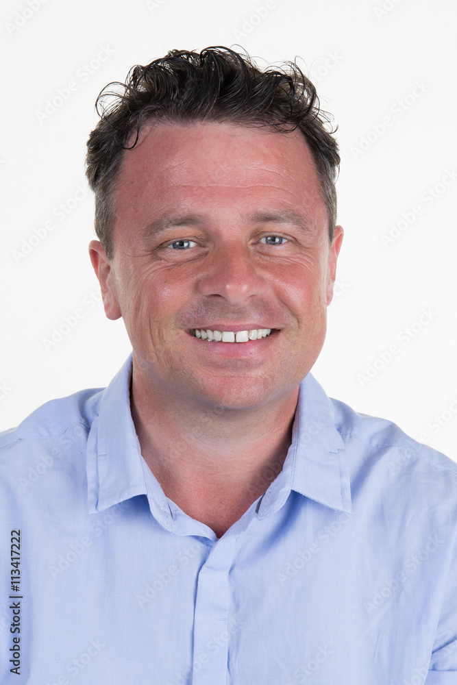 Portrait of a happy charming, smiling man looking at camera Portrait of a happy charming, smiling man looking at camera