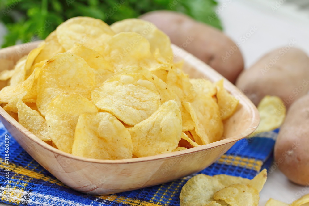 Potato chips in bowl Potato chips in bowl