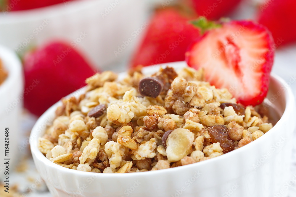 Oat granola with almond, chocolate and fresh strawberry Oat granola with almond, chocolate and fresh strawberry