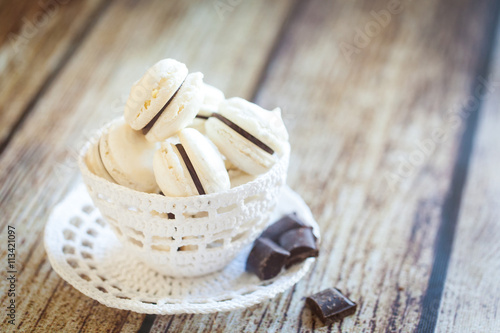 Vanilla macarons with chocolate ganache