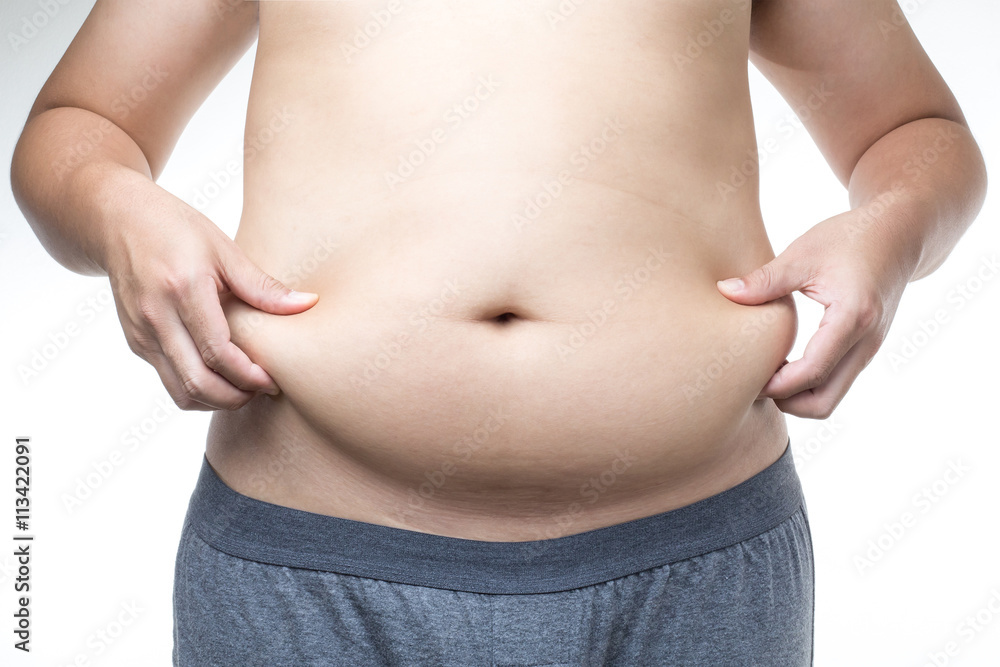 Naklejka premium overweight man with hand holding fat belly