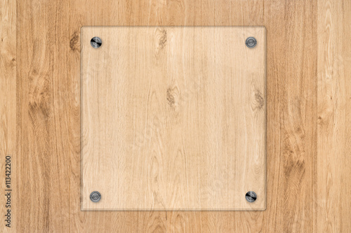 glass board on wooden background