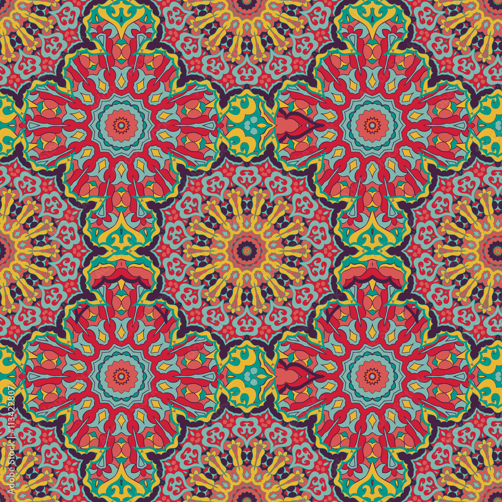 Seamless ethnic pattern with mandala.