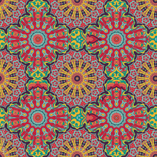 Seamless ethnic pattern with mandala.