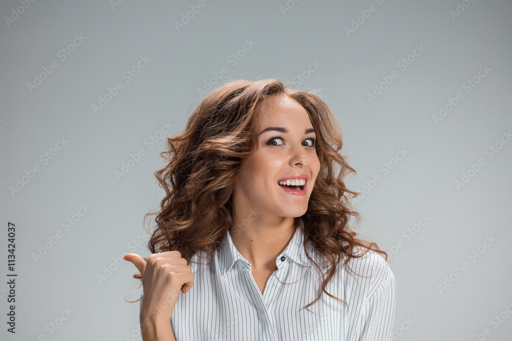The young woman's portrait with happy emotions The young woman's portrait with happy emotions