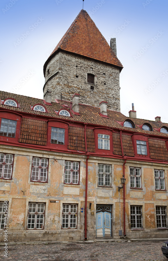 Old house and fortification tower on the Old city street. Tallinn. Estonia