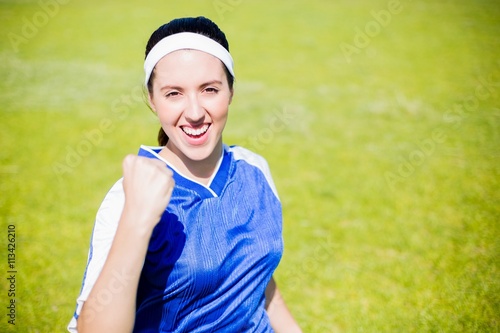 Happy soccer player posing after victory © WavebreakmediaMicro