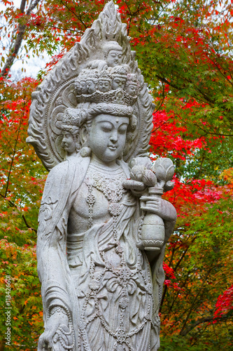 Stone Chinese Godess statue at Eikando Temple in Kyotop