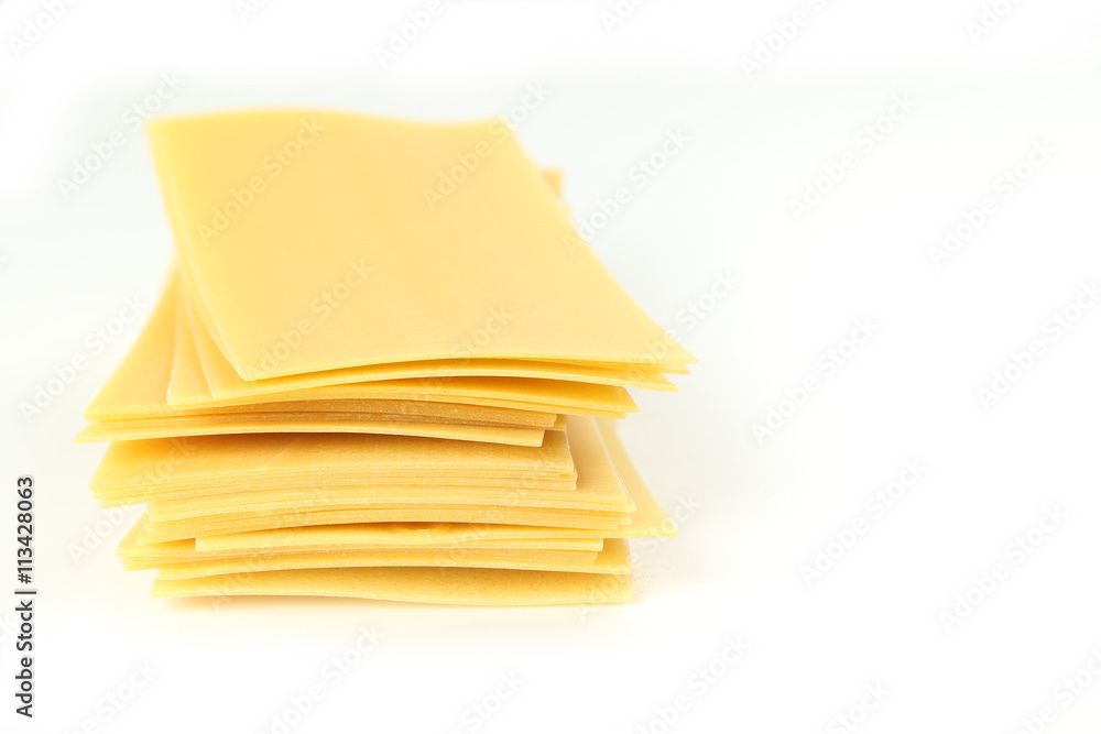 Lasagne sheets pasta isolated on a white Lasagne sheets pasta isolated on a white
