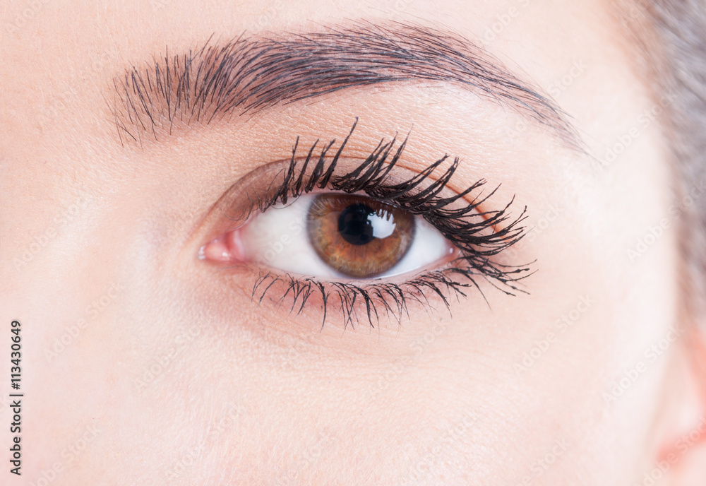 Beauty close-up eye with mascara and natural skin look Beauty close-up eye with mascara and natural skin look