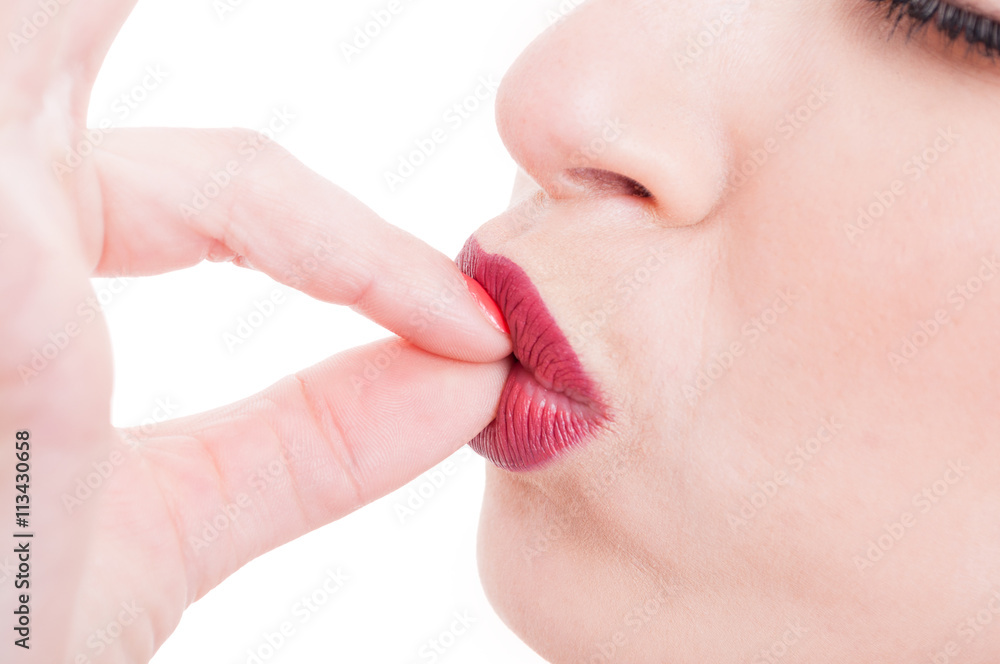 Kissing fingers studio close-up gesture