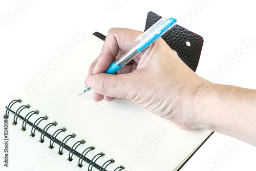 Secretary jotting down meeting details in the notebook isolated on white background