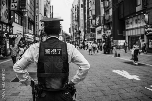 Cop in the streets of Tokyo