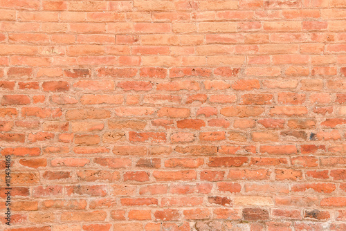 Orange grunge brick wall texture background