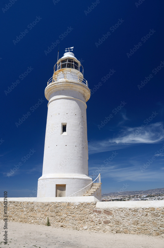 Old white lighthouse near the city of New Paphos ,Cyprus,Europe