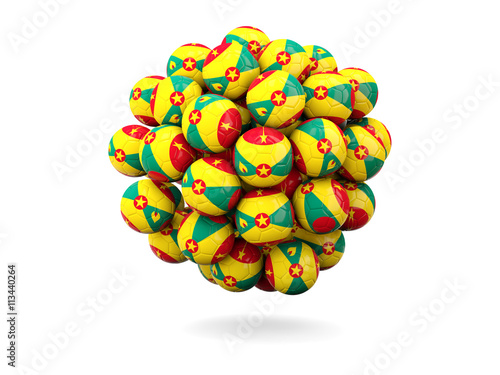 Pile of footballs with flag of grenada