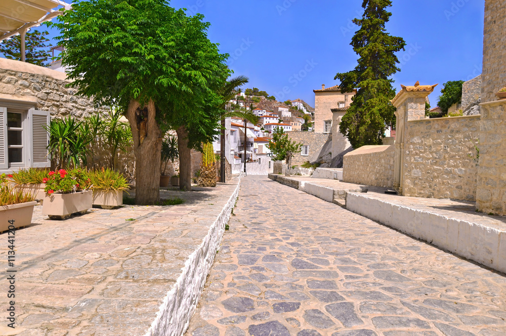 traditional houses and road without cars at Hydra island Greece