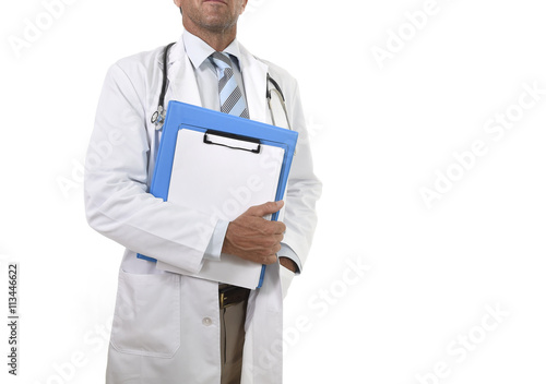 anonymous corporate portrait of confident male medicine doctor with stethoscope holding clipboard