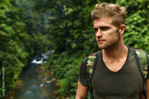 Travel And Tourism. Tourist Man Adventure On Summer Vacation. Beautiful Handsome Free Happy Cheerful Young Male Traveler Enjoying Nature Beauty Of Forest In Summer. Hike, Healthy Active Lifestyle