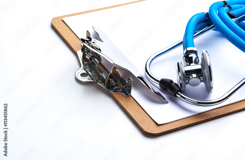 Empty prescription lying on table with stethoscope Empty prescription lying on table with stethoscope