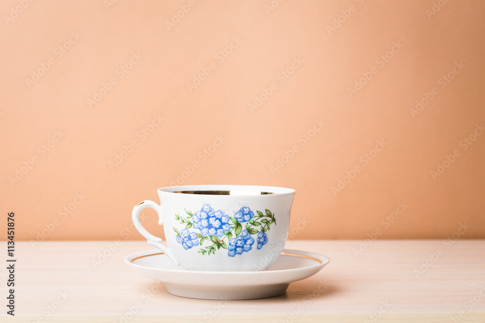Cup of black tea in a china cup and saucer Cup of black tea in a china cup and saucer