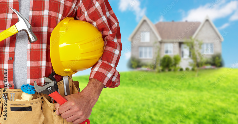 Builder handyman with construction tools. Builder handyman with construction tools.